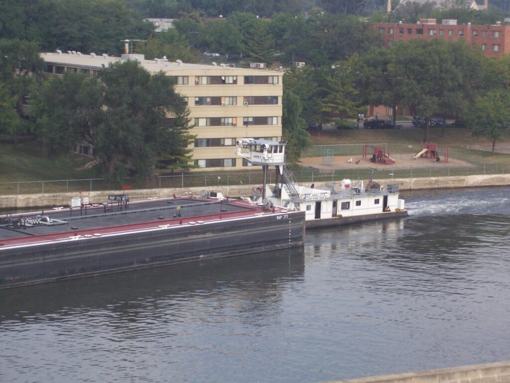 Close up of barge and tug boat on the DesPlaine River, Joliet, Illinois