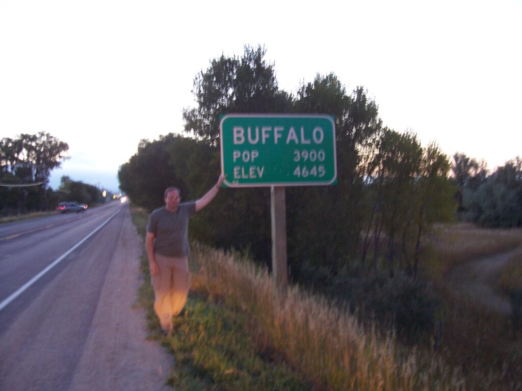 photo-rob-standing-by-sign-for-buffalo-wyoming